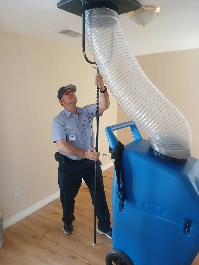 HVAC Installation technician using HEPA equipment in Walker